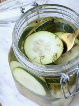 pickle chips in glass jar with fork