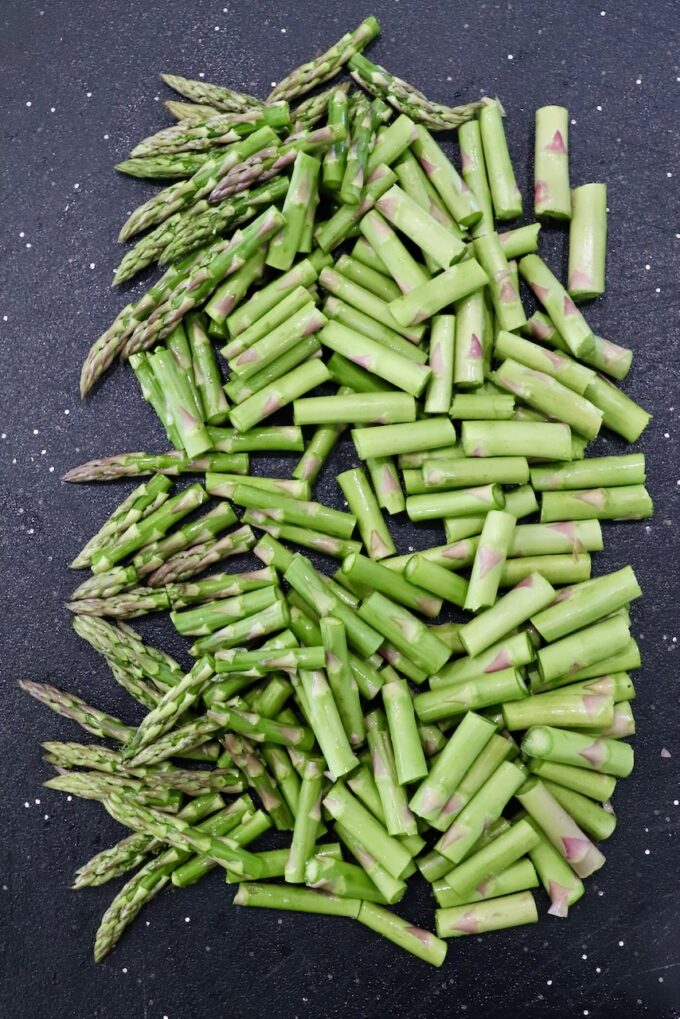 diced asparagus on cutting board