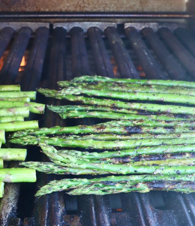 fresh asparagus spears on a grill
