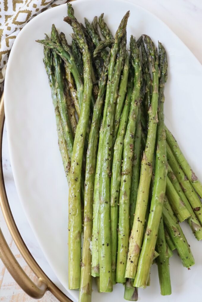 roasted asparagus spears on plate