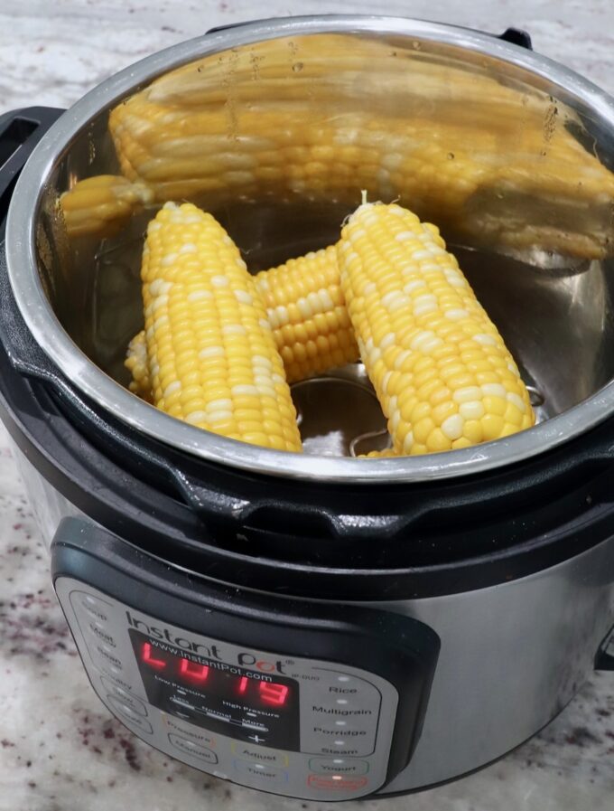 cooked ears of corn in an Instant Pot