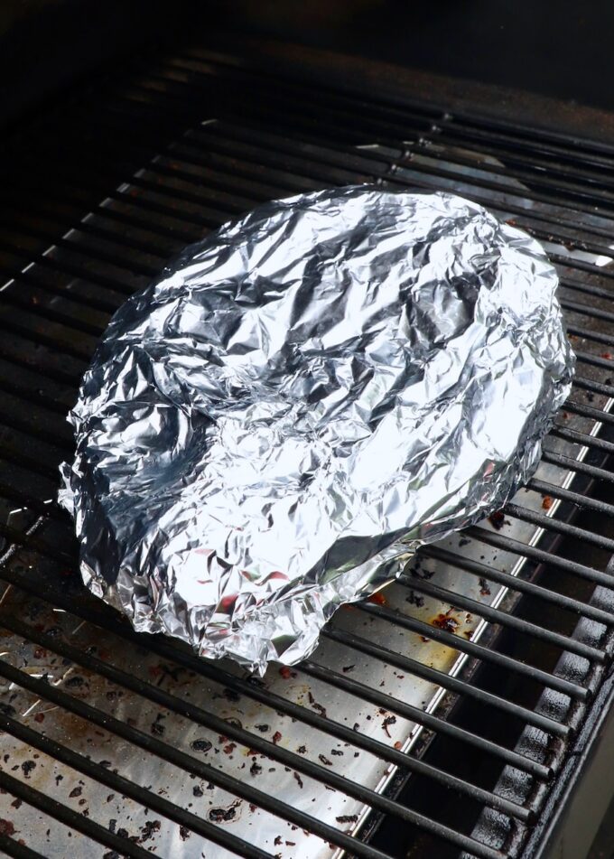 chuck roast wrapped in foil on smoker