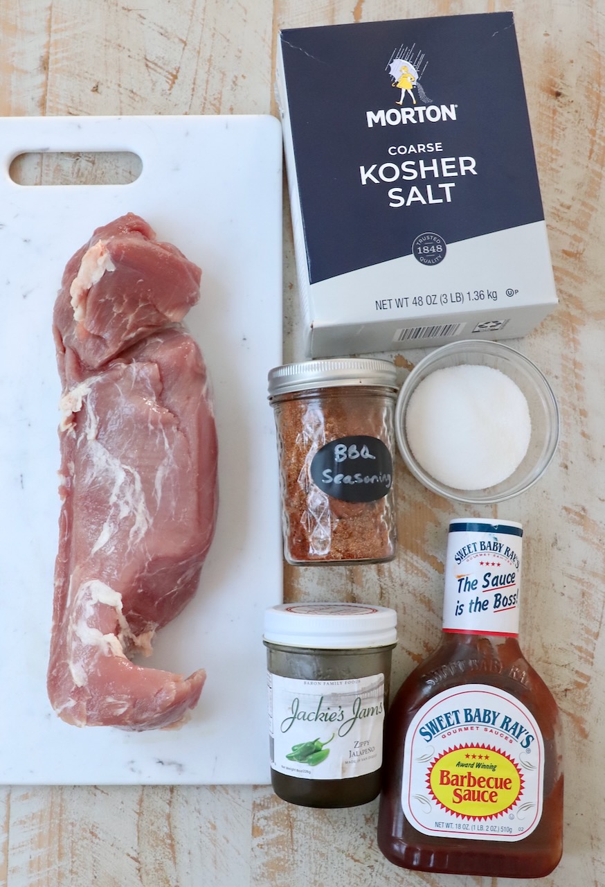 ingredients for smoked pork tenderloin on white wood board