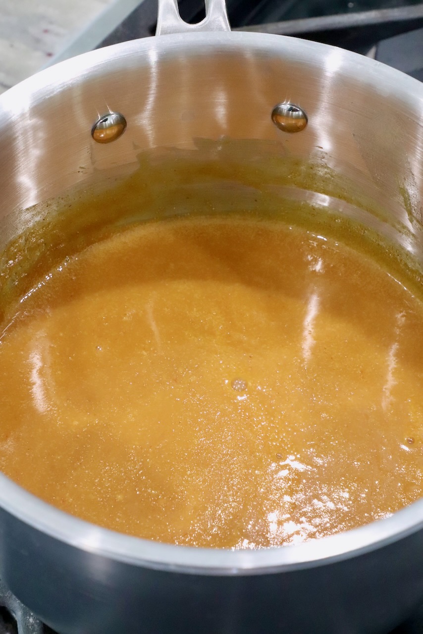 mustard bbq sauce in pot on the stove