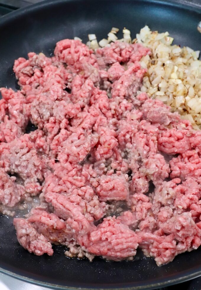 ground beef, diced onions and garlic in a large skillet