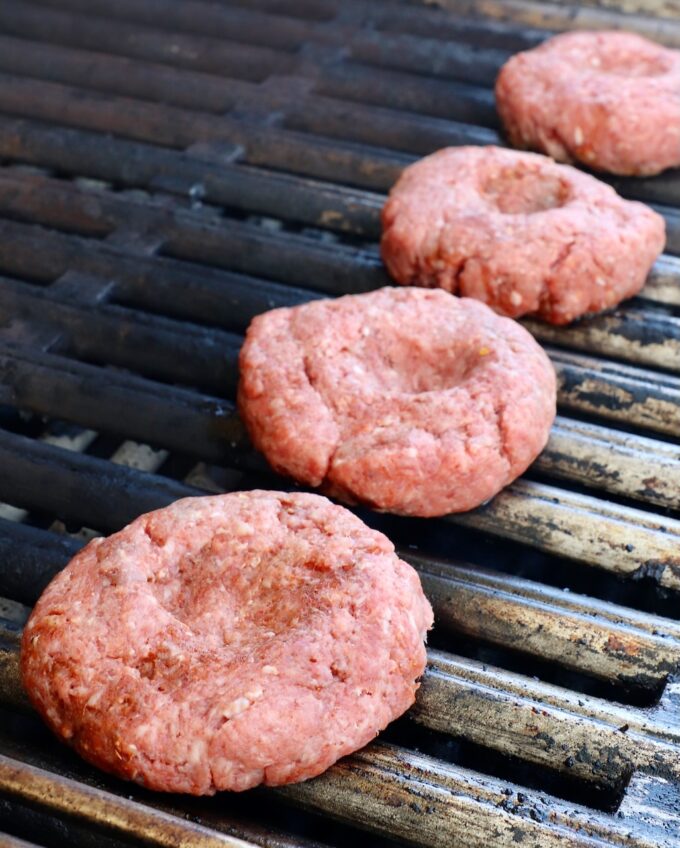burger patties on a grill