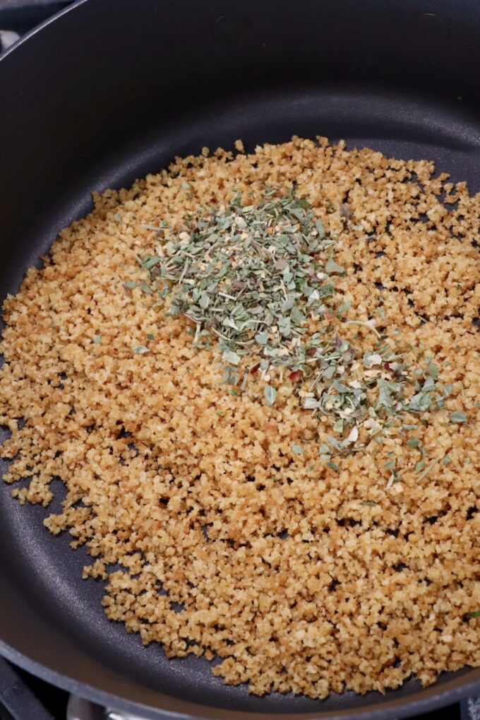 toasted breadcrumbs with herbs and spices in skillet