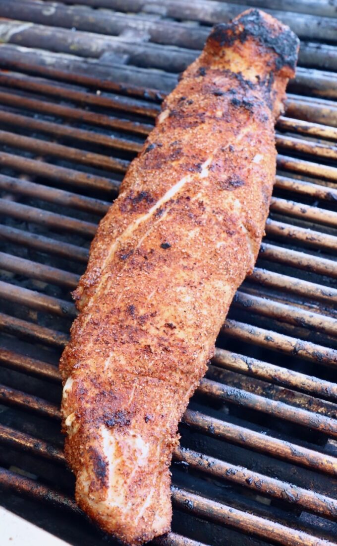 seasoned pork tenderloin on grill