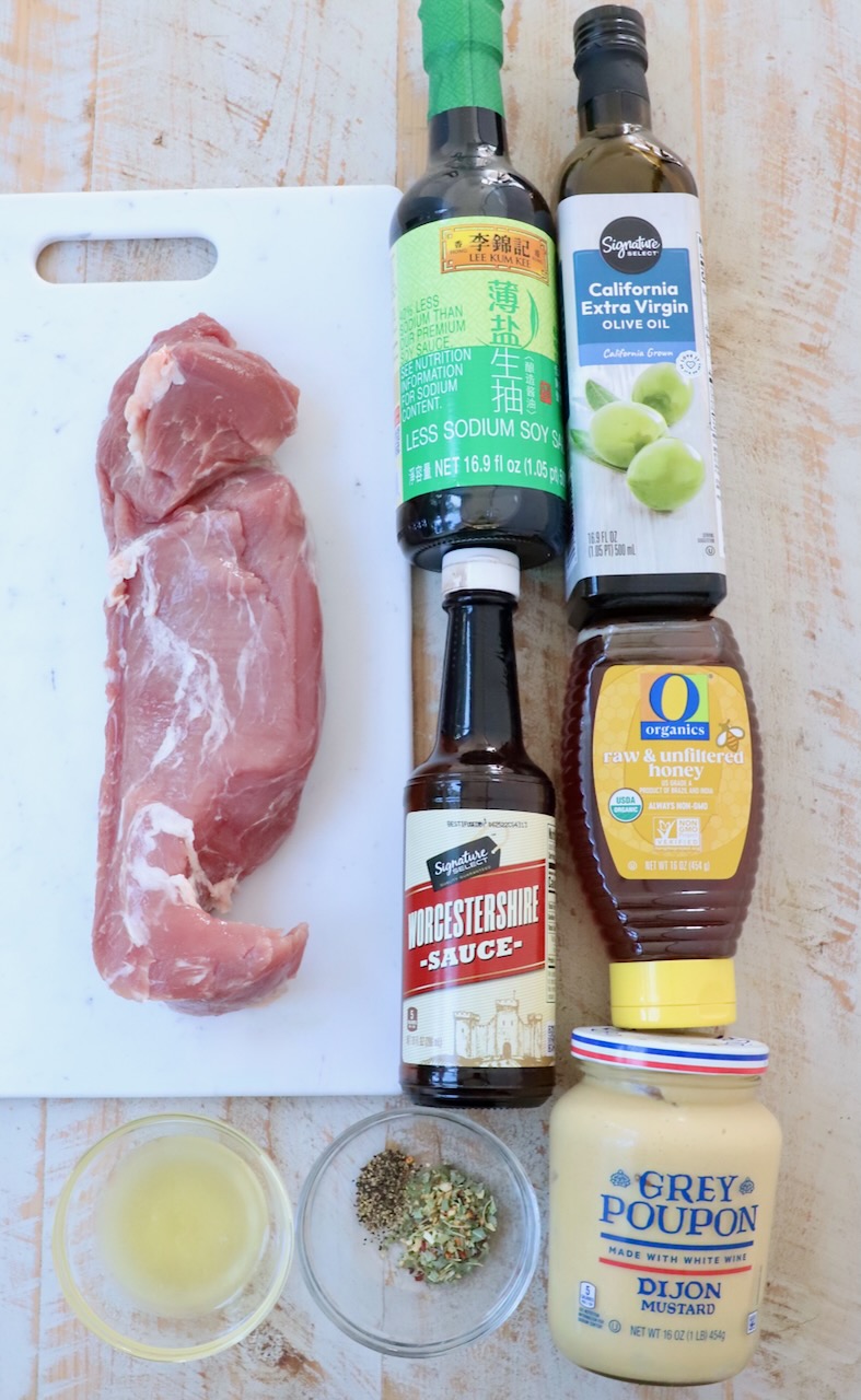 ingredients for pork tenderloin marinade on white wood board