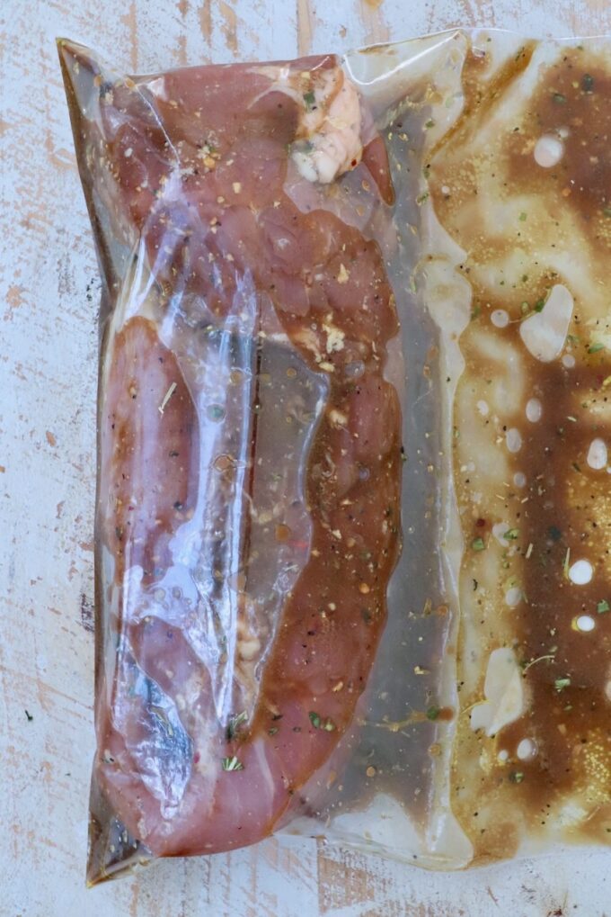 pork tenderloin in marinade in zipper bag
