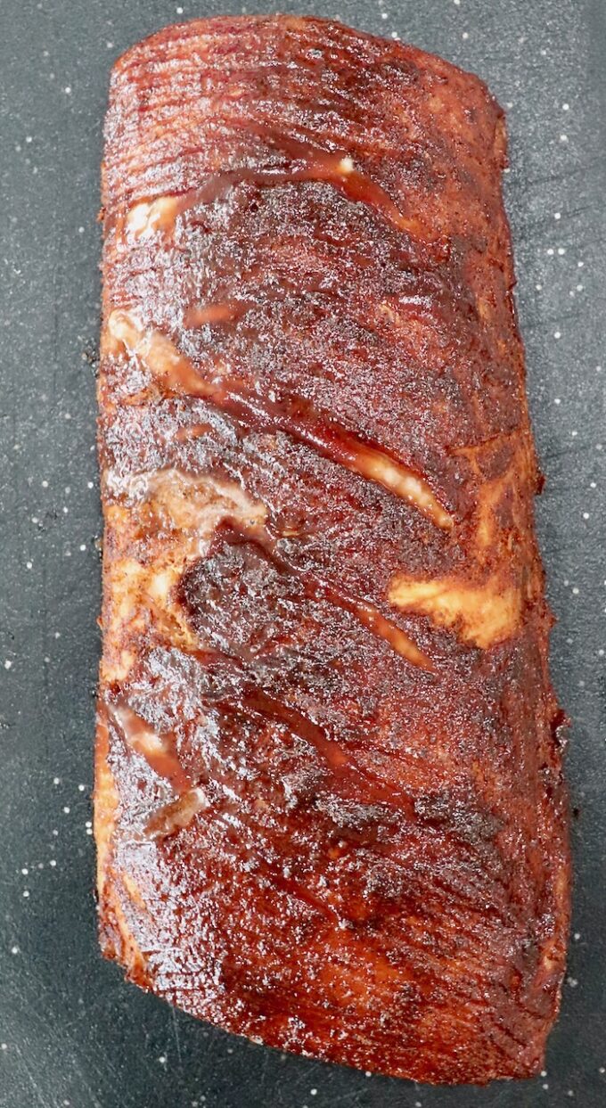 glazed smoked pork loin on cutting board