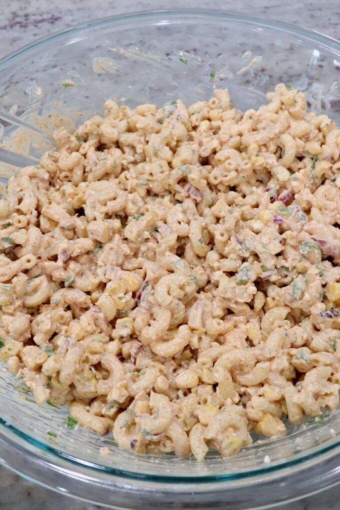 Mexican street corn pasta salad in large glass bowl