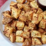 seasoned roasted cubed potatoes on plate