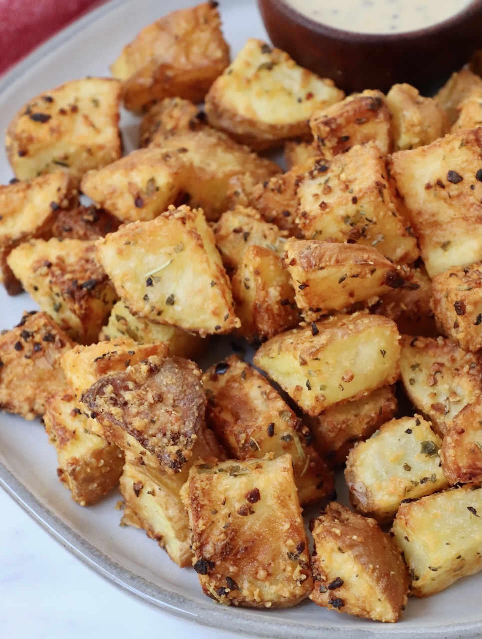 cubed roasted and seasoned potatoes on plate