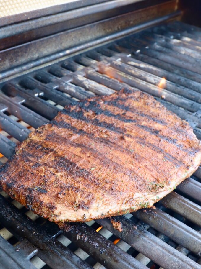 grilled flank steak on grill