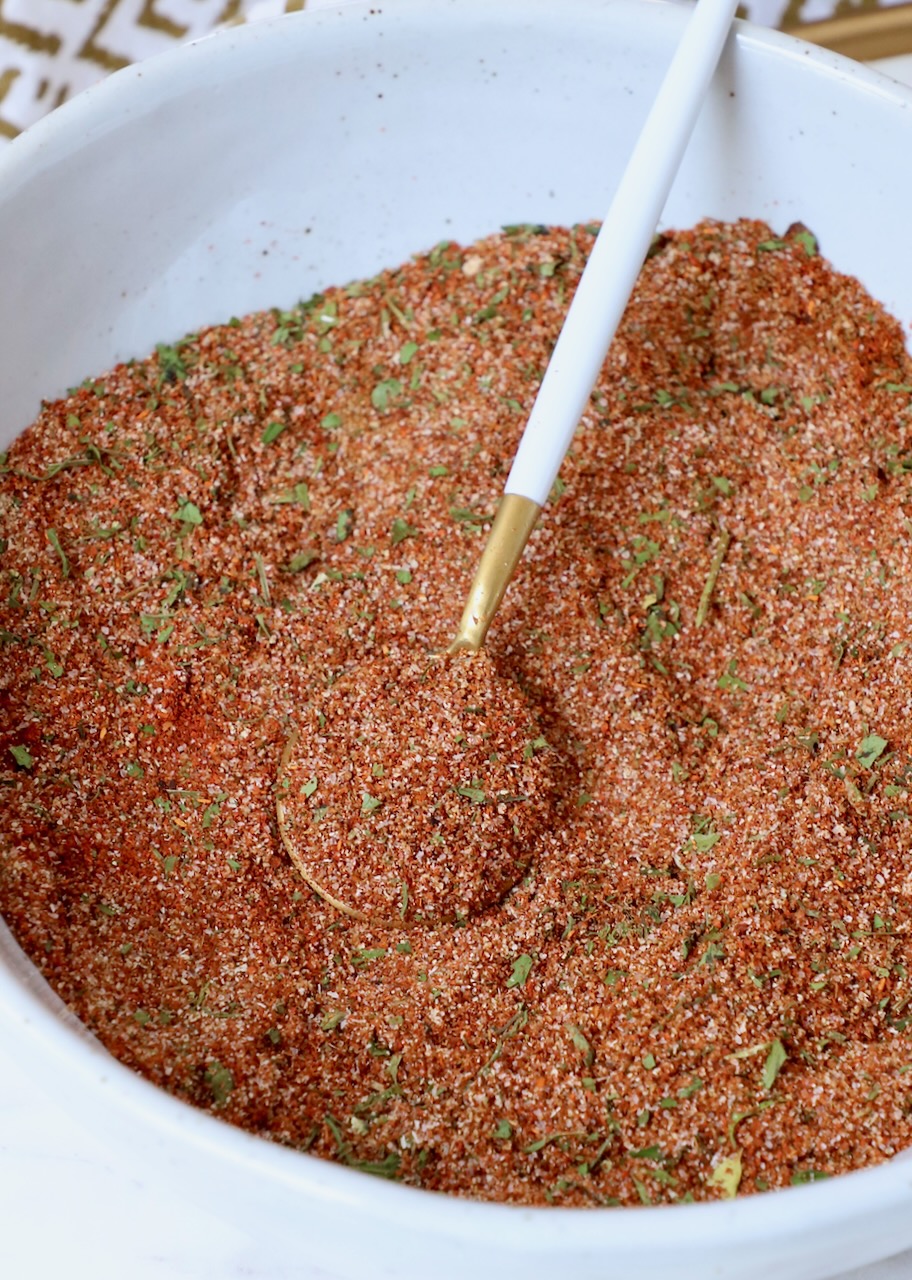 carne asada seasoning in bowl with spoon