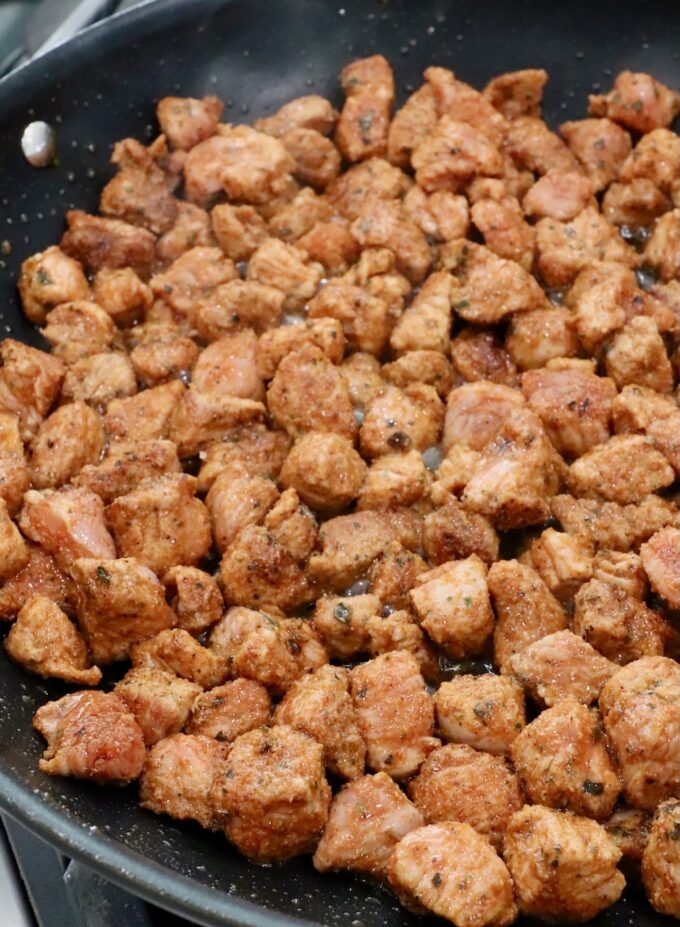 seasoned cooked diced pork in skillet