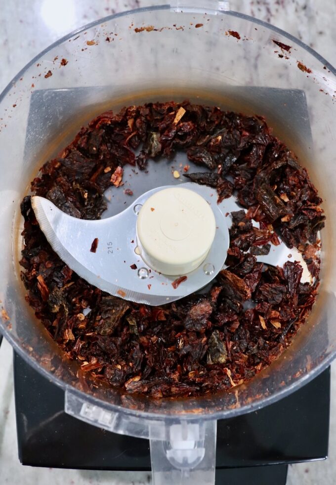 finely chopped dried chiles in a food processor