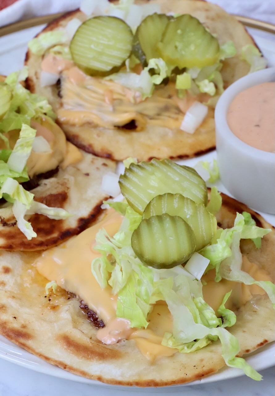 smash burger tacos on a plate