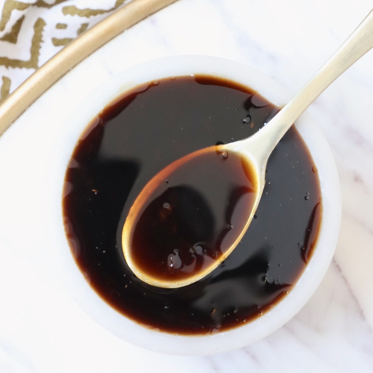 teriyaki sauce in small bowl with spoon