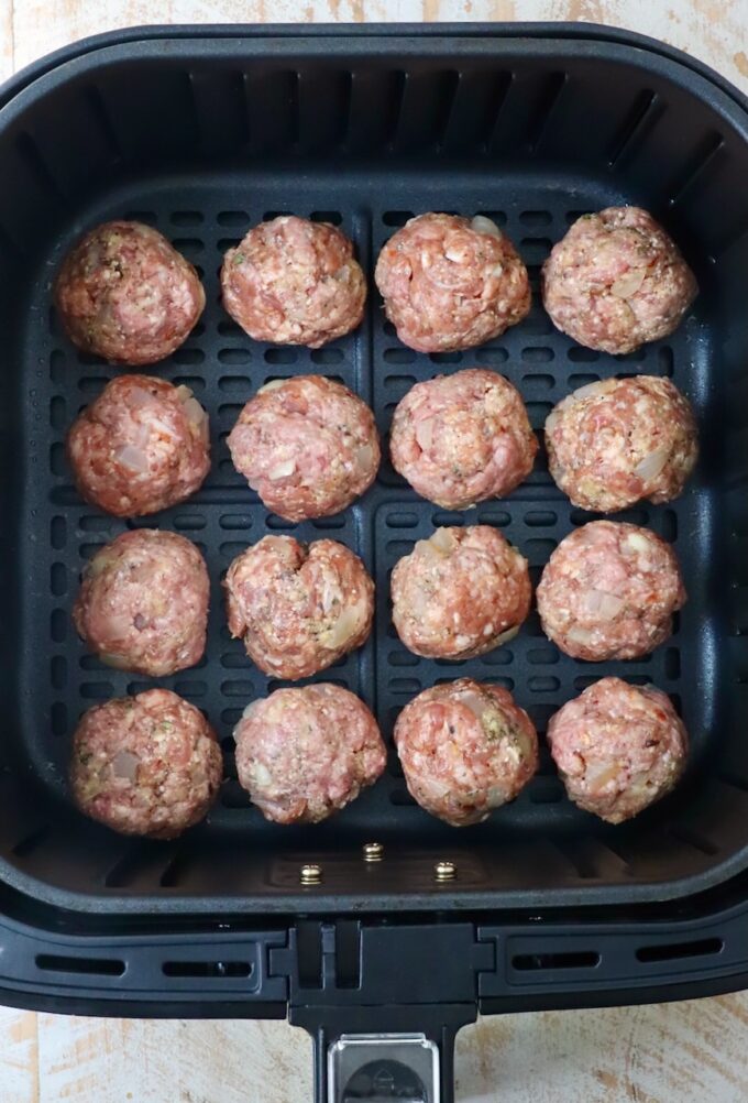 raw meatballs in air fryer basket