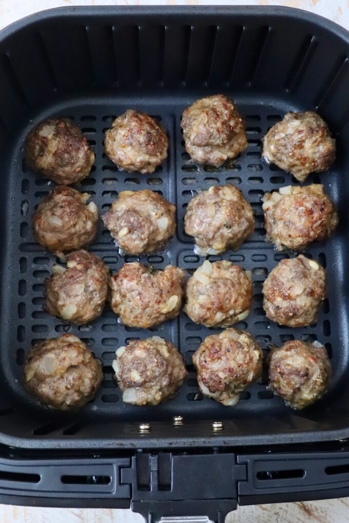 cooked meatballs in air fryer basket