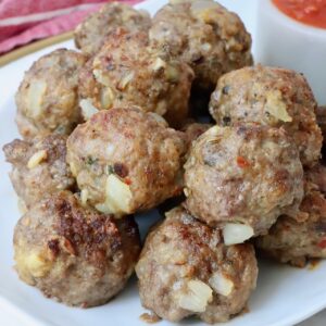 air fried meatballs stacked up on a plate