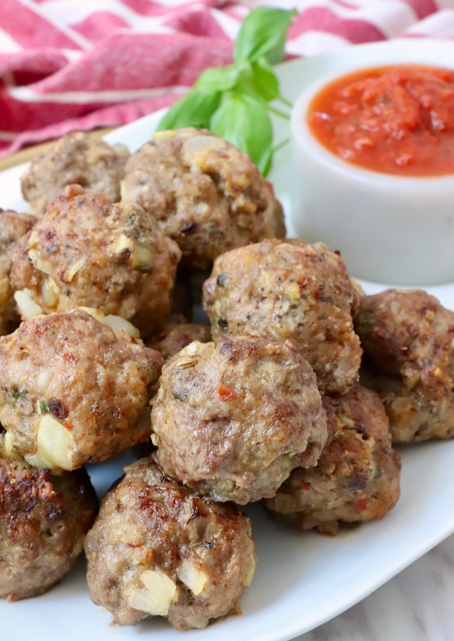 meatballs stacked up on a plate