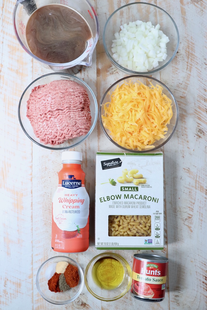 ingredients for homemade hamburger helper on white wood board