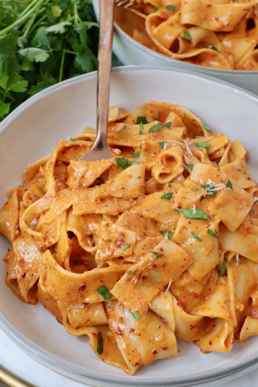 nduja pasta in bowl with fork