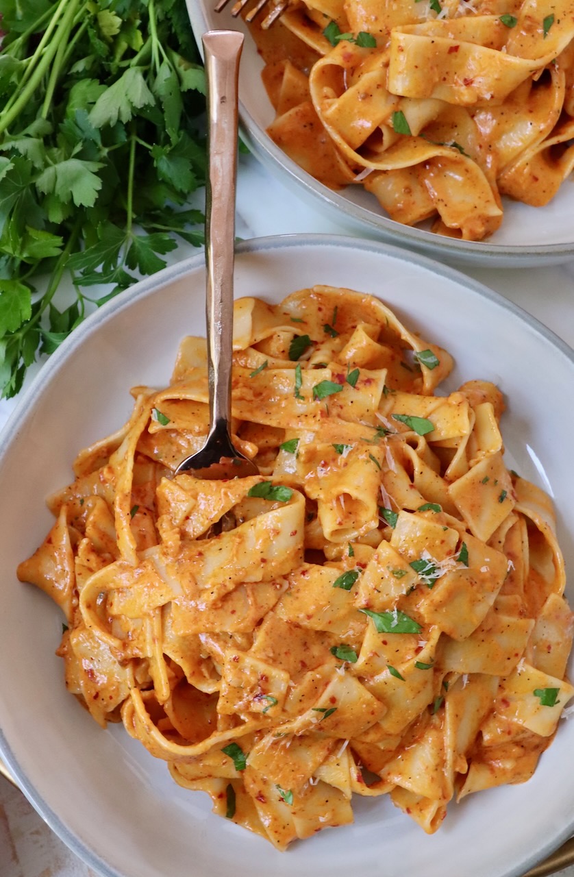 nduja pasta in bowl with fork