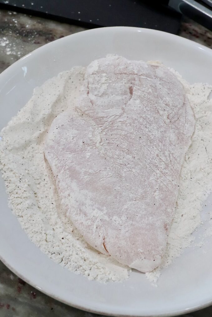 chicken breast coated in flour