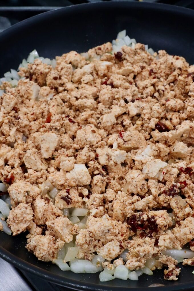 seasoned crumbled tofu in a skillet