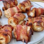 bacon roll ups on a plate