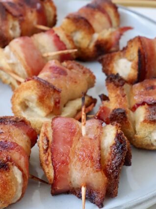 bacon roll ups on a plate