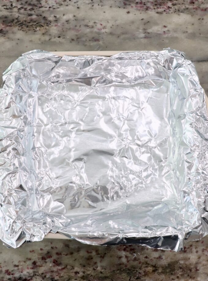 foil pressed in square baking dish