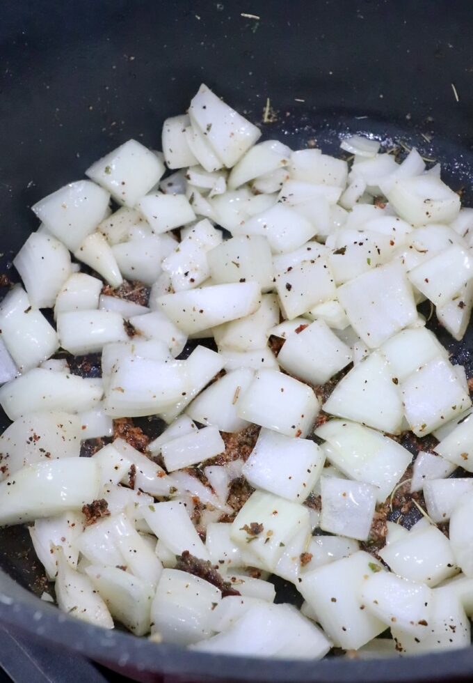 large diced onions in a dutch oven