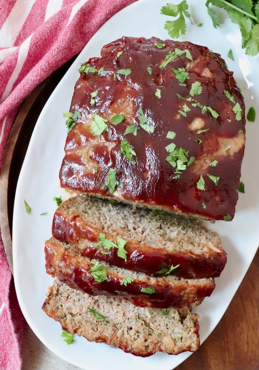 turkey meatloaf sliced on a white plate