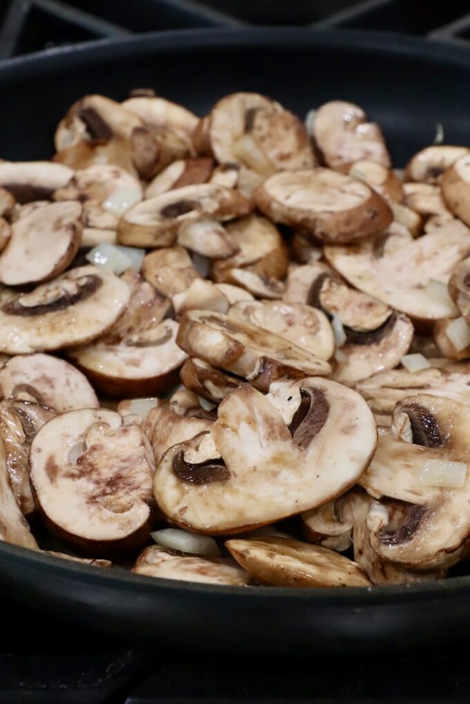 sliced mushrooms in a large skillet