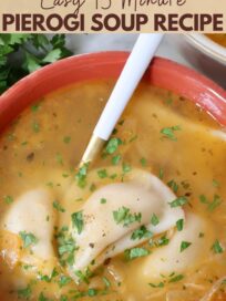 pierogi soup in bowl with a spoon