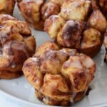 pull apart pumpkin spice cinnamon rolls on a plate