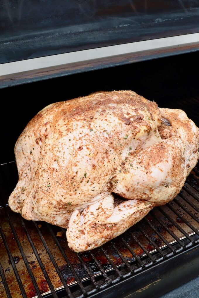 seasoned turkey on a smoker