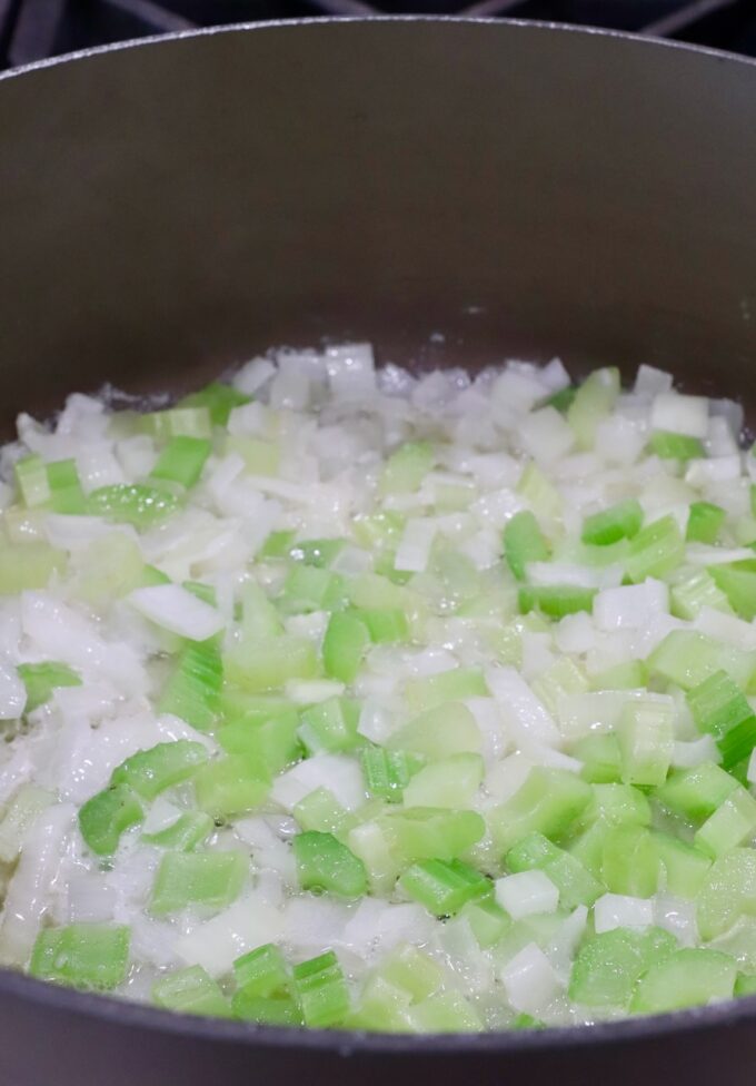 diced onions and celery in a large pot