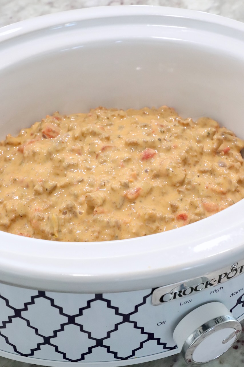 velvetta rotel dip in a small crock pot