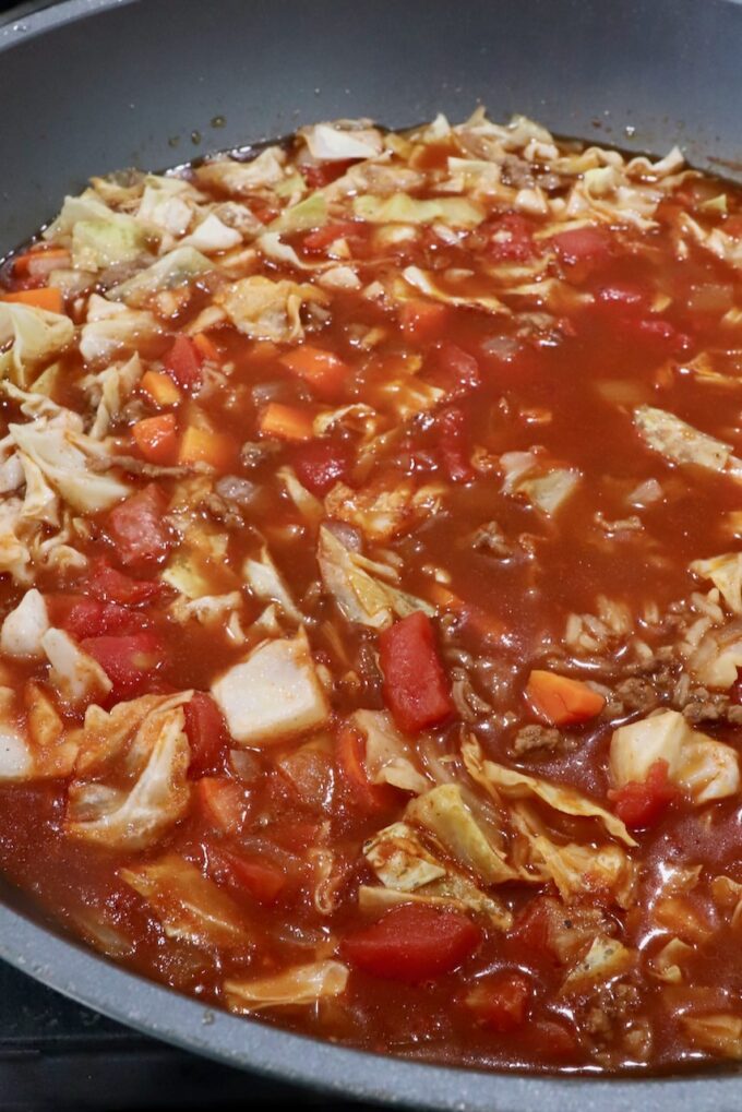 cooked cabbage roll soup in a large pot on the stove