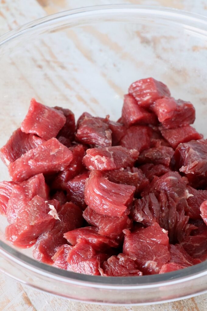 cubes of steak in a glass bowl