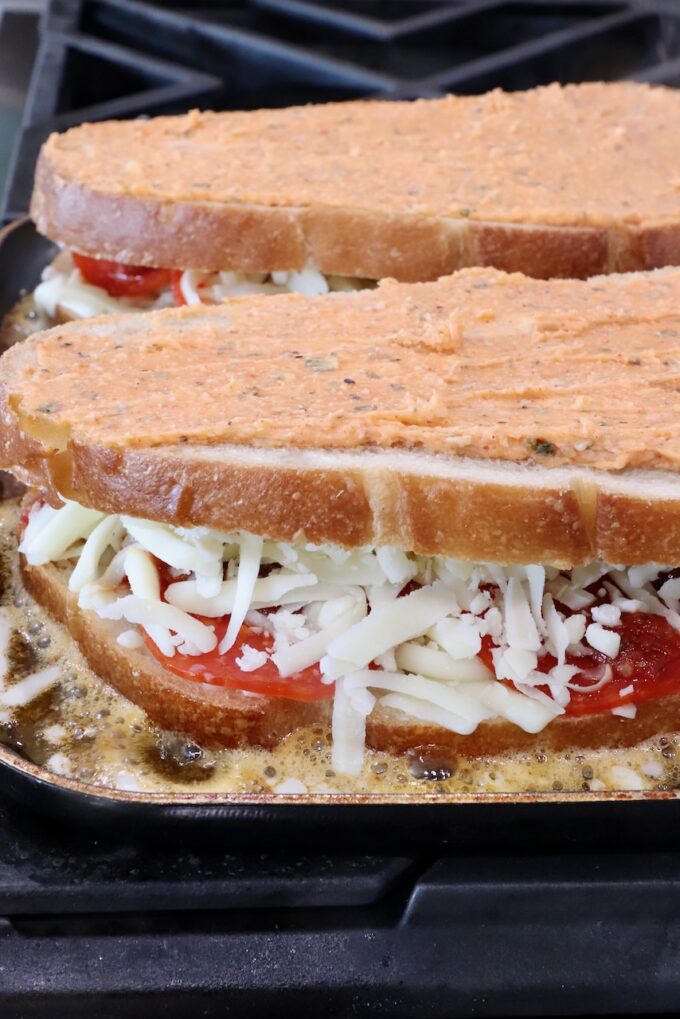 pizza grilled cheese sandwiches in a skillet