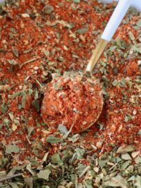 pizza seasoning in a bowl with a spoon