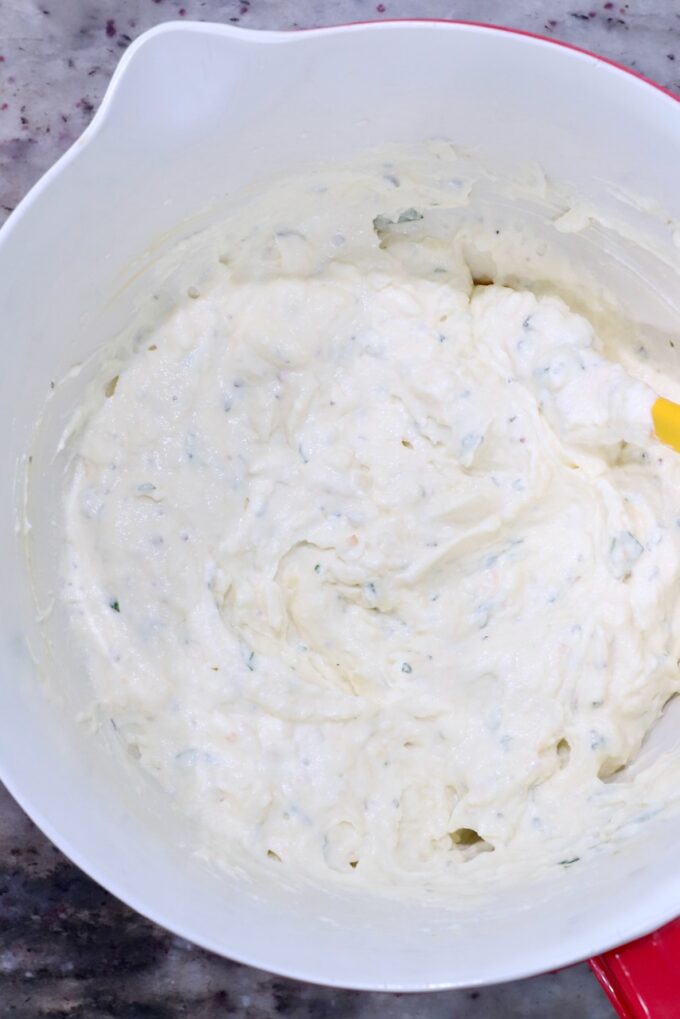 seasoned ricotta cheese in a large mixing bowl