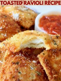 toasted ravioli stacked up on a plate with a bite taken out of one ravioli and a small bowl of marinara sauce on the side